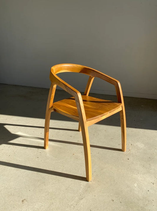 Curved back solid wood chair